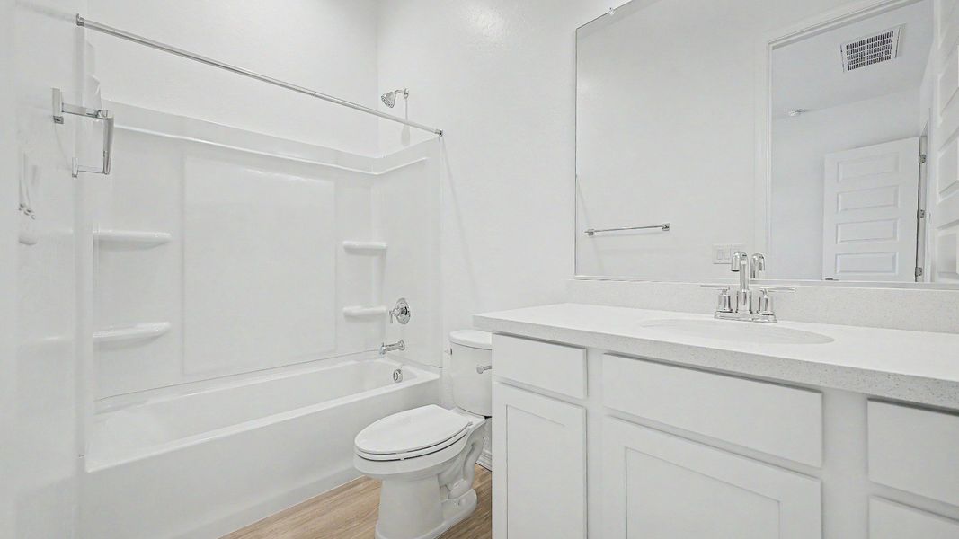 Furnished interior view inside a new home in Windrose, Waddell (Image 28).