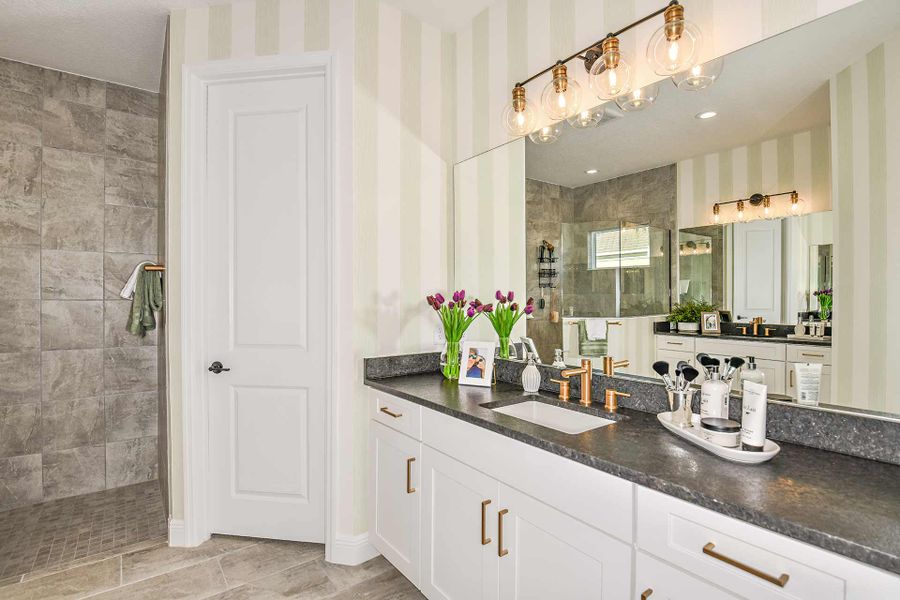 Representative furnished interior of a home built from the Triumph by Neal Communities in Verandah, Fort Myers (Image 17).