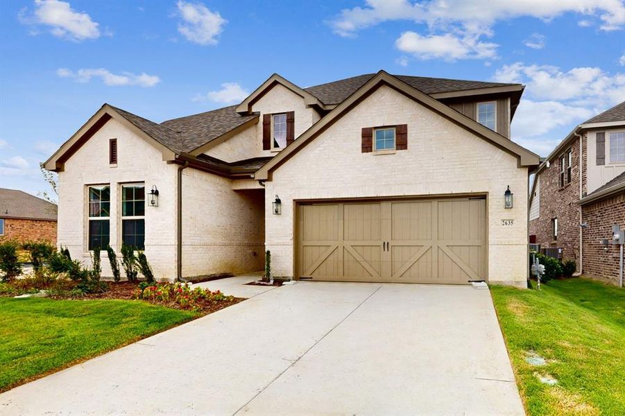 Front exterior of a new home in , Celina, TX, highlighting curb appeal (Image 14). Front exterior of a new home in , Celina, TX, highlighting curb appeal (Image 14).