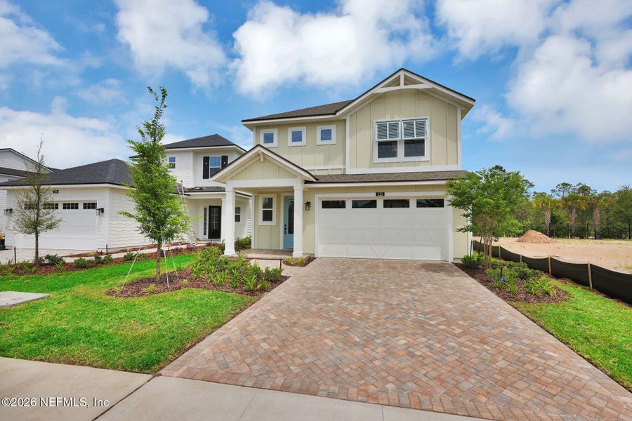 Front exterior of a new home in Seabrook Village at Seabrook, Ponte Vedra, FL, highlighting curb appeal (Image 30). Front exterior of a new home in Seabrook Village at Seabrook, Ponte Vedra, FL, highlighting curb appeal (Image 30).