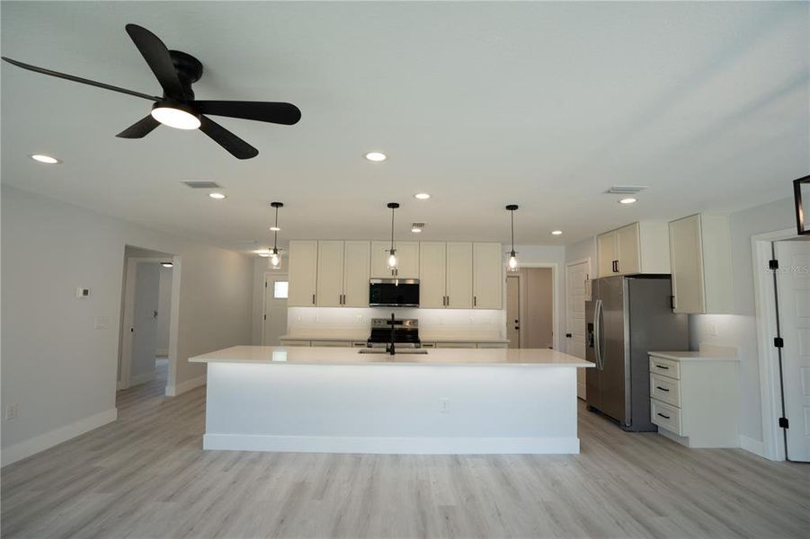 Furnished interior view inside a new home in , Dunnellon (Image 8).