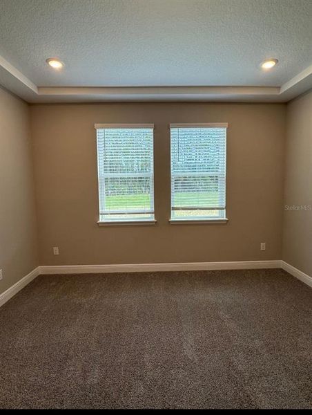 Spacious, unfurnished interior of a new home in Legends Preserve - Signature Series, Daytona Beach (Image 14).