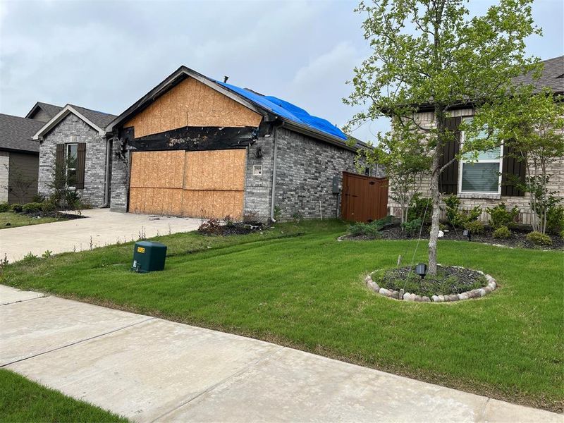 Front exterior of a new home in , Crandall, TX, highlighting curb appeal (Image 7).