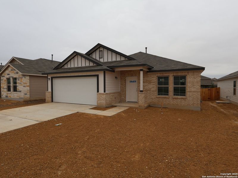 Front exterior of a new home in Winding Brook, San Antonio, TX, highlighting curb appeal (Image 2). Front exterior of a new home in Winding Brook, San Antonio, TX, highlighting curb appeal (Image 2).
