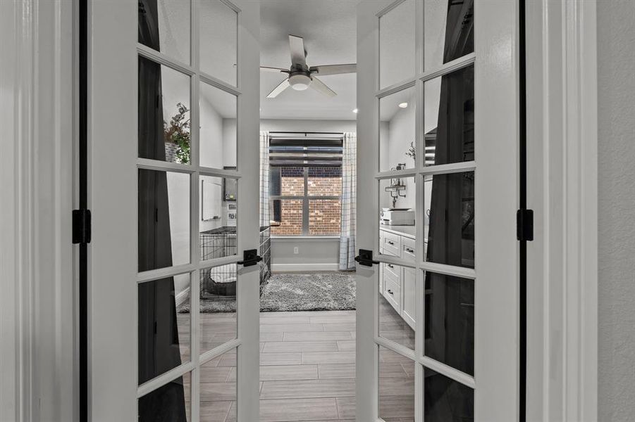 Spacious closet with wood-type flooring and ceiling fan