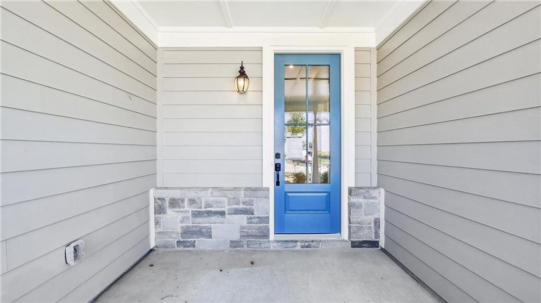 Exterior details and patio area of a home in Cresswind Georgia at Twin Lakes, Hoschton (Image 31).