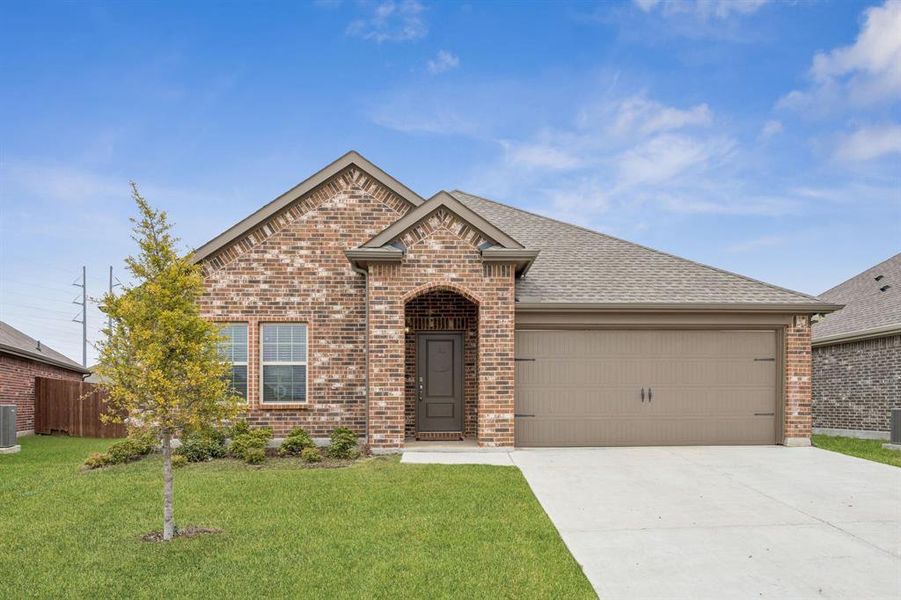 Front exterior of a new home in , Lavon, TX, highlighting curb appeal (Image 2).