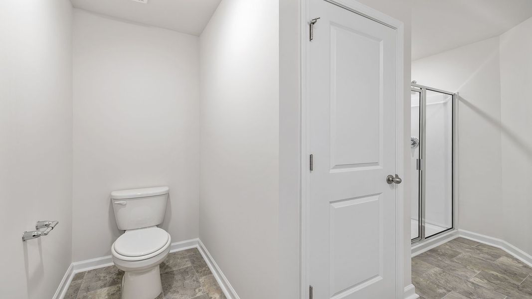 Furnished interior view inside a new home in Tanglewood Townes, Greenville (Image 9).