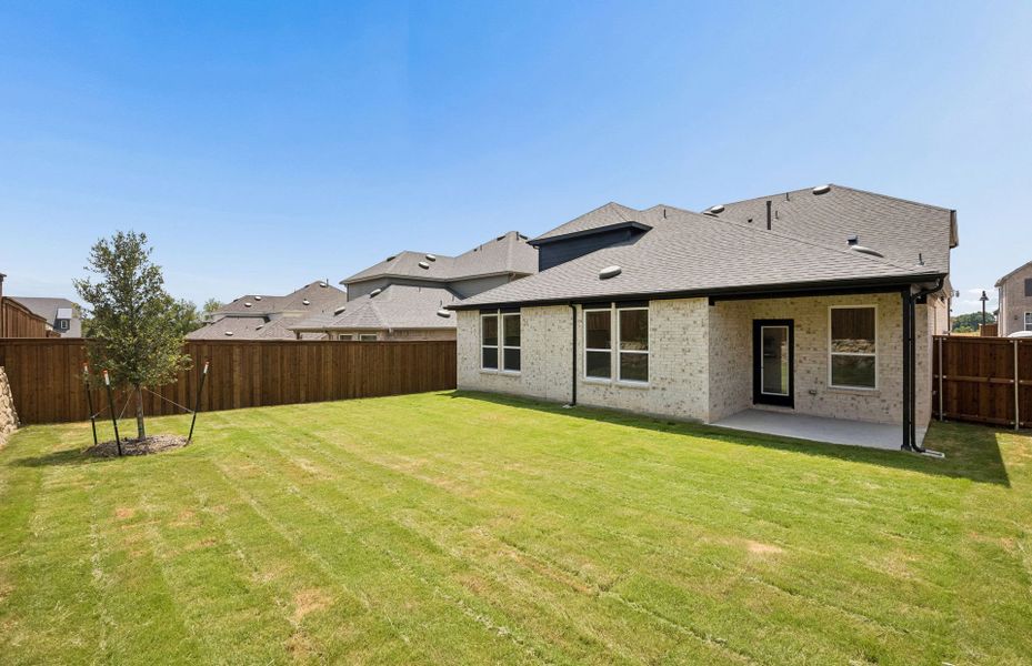 Exterior details and patio area of a home in Wilson Creek Meadows, Celina (Image 2). Exterior details and patio area of a home in Wilson Creek Meadows, Celina (Image 2).