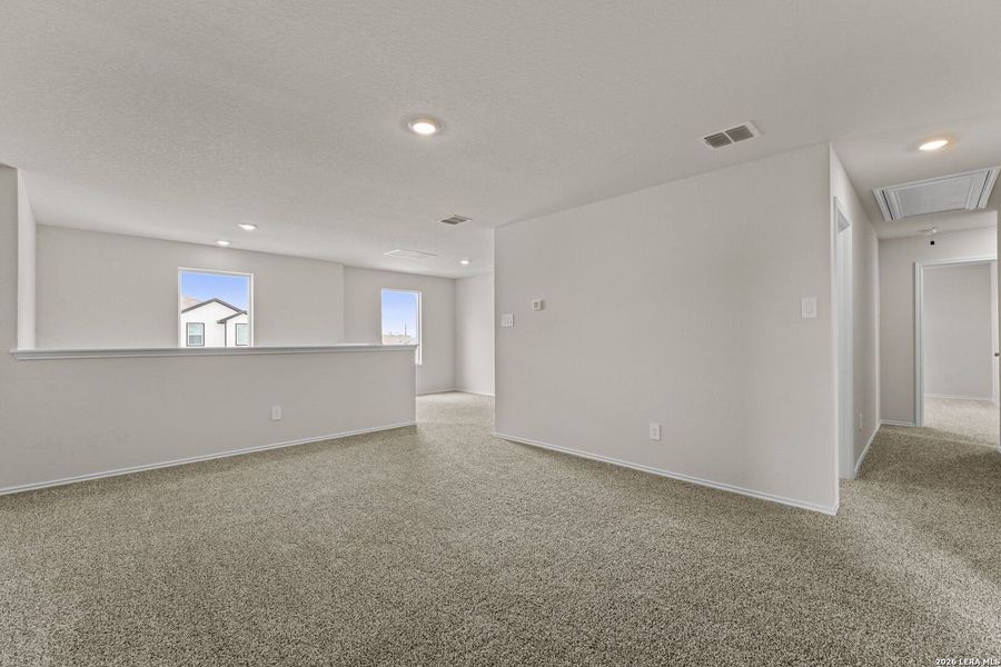 Spacious, unfurnished interior of a new home in Swenson Heights, Seguin (Image 27).