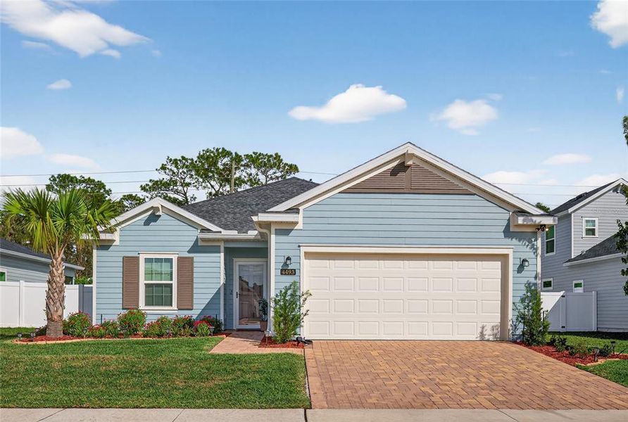 Front exterior of a new home in , Ocala, FL, highlighting curb appeal (Image 1). Front exterior of a new home in , Ocala, FL, highlighting curb appeal (Image 1).