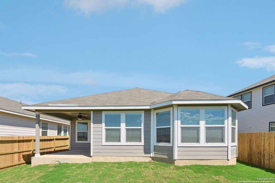 Exterior details and patio area of a home in Estancia Ranch - Premier Series, San Antonio (Image 21). Exterior details and patio area of a home in Estancia Ranch - Premier Series, San Antonio (Image 21).