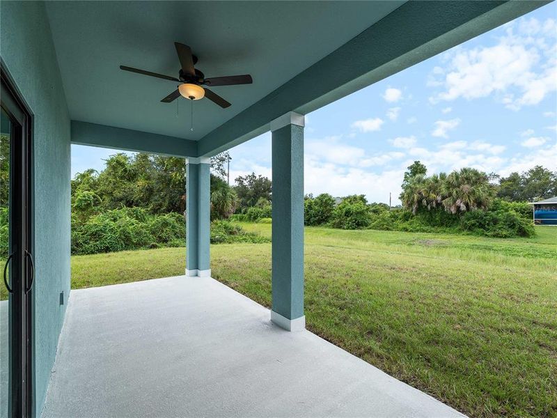 Exterior details and patio area of a home in , North Port (Image 35).