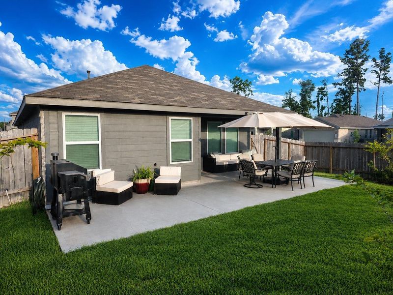 Exterior details and patio area of a home in , Spring (Image 3). Exterior details and patio area of a home in , Spring (Image 3).