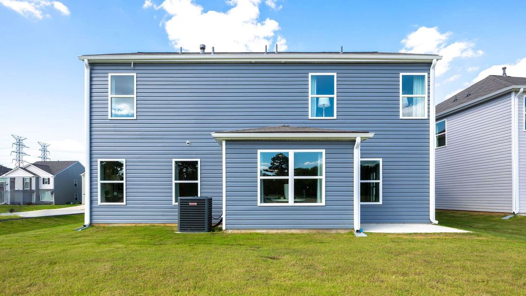 Front exterior of a new home in Hawk's Ridge, Rossville, GA, highlighting curb appeal (Image 2).