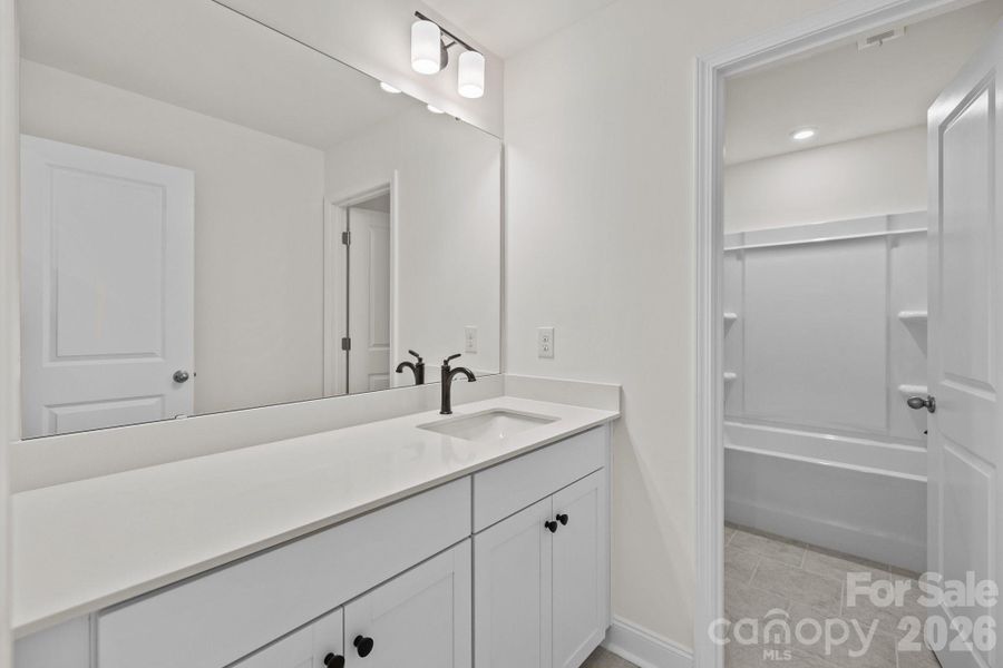 Secondary Upstairs BathPhotos are representative and may not reflect the exact home, finishes, or features.