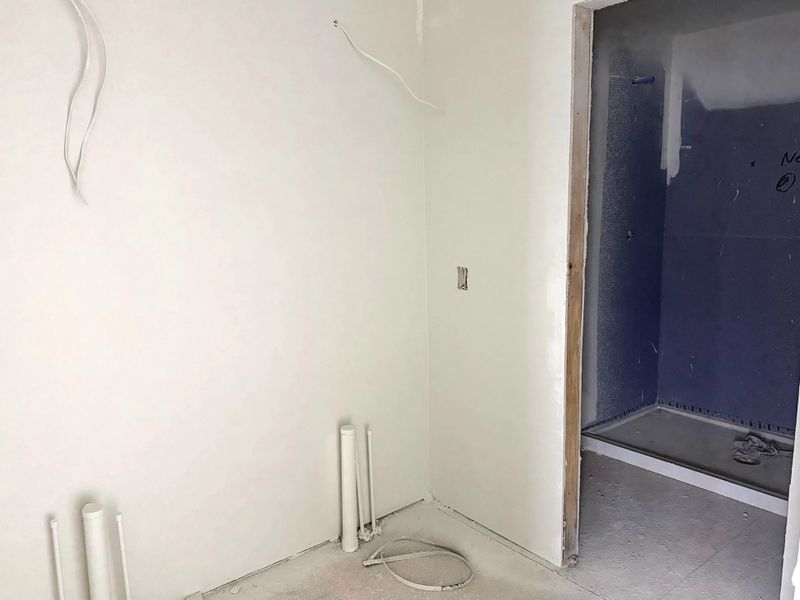 Primary bathroom will feature aspects of AW Collection® Sapphire, double sinks and a frameless walk-in shower - under construction