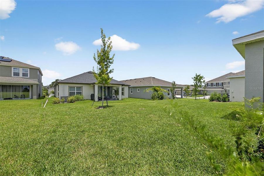 Front exterior of a new home in Waterset, Apollo Beach, FL, highlighting curb appeal (Image 22).