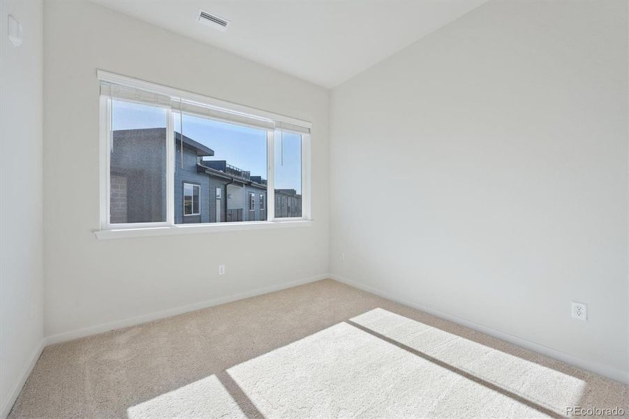 Spacious, unfurnished interior of a new home in Condo Collection at Grand Vue at Interlocken, Broomfield (Image 14).