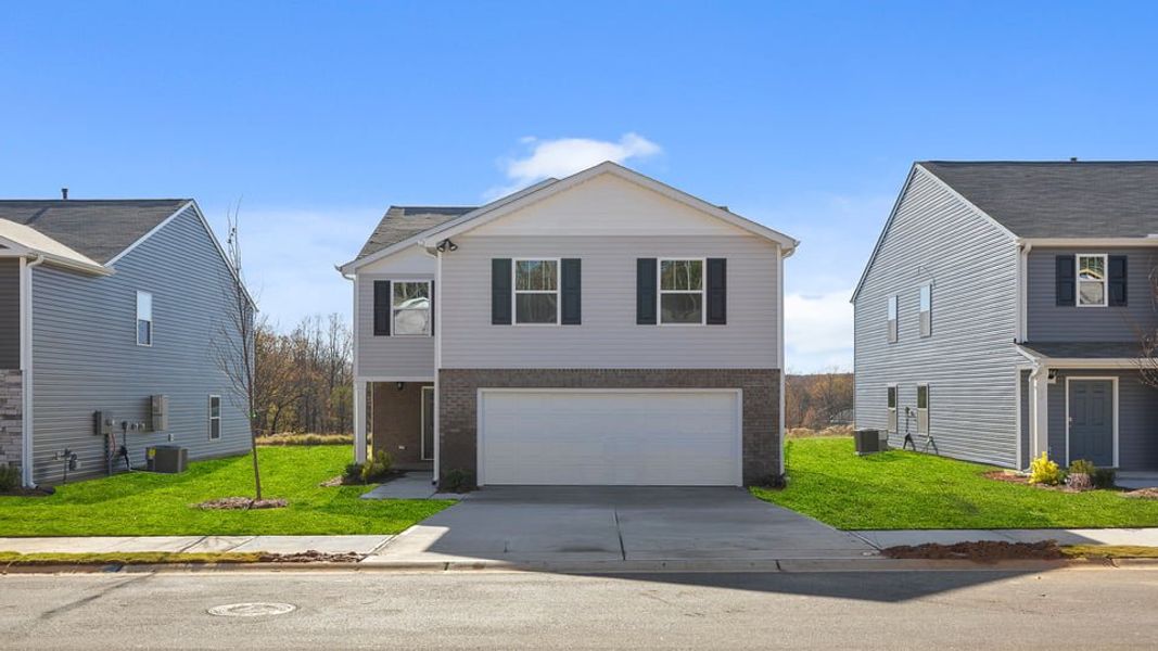 Front exterior of a new home in Cloverdale Hills, Piedmont, SC, highlighting curb appeal (Image 1).