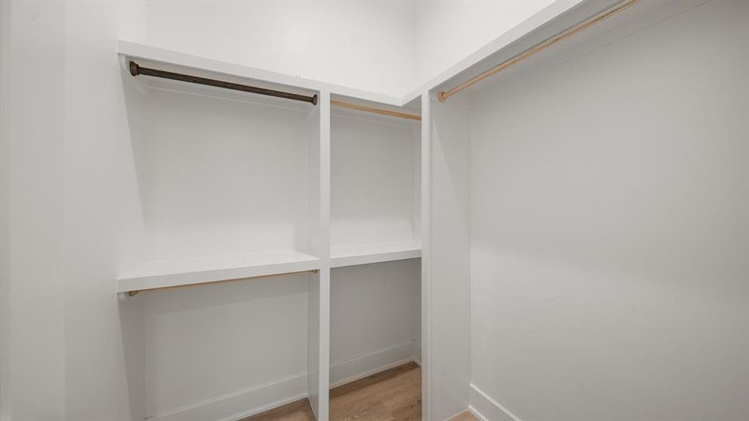 Spacious walk-in closet for the 1st floor bedroom.