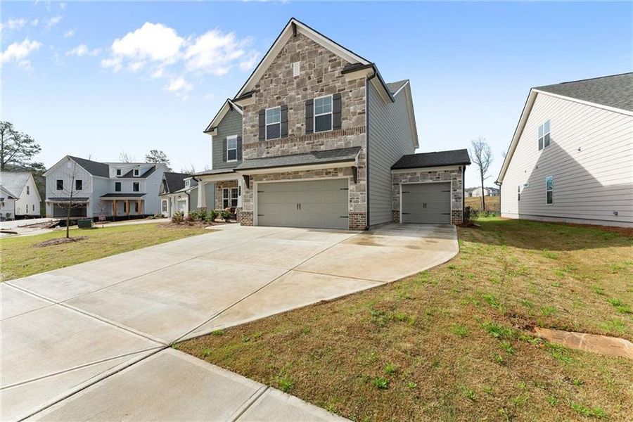 Front exterior of a new home in , Gainesville, GA, highlighting curb appeal (Image 23).