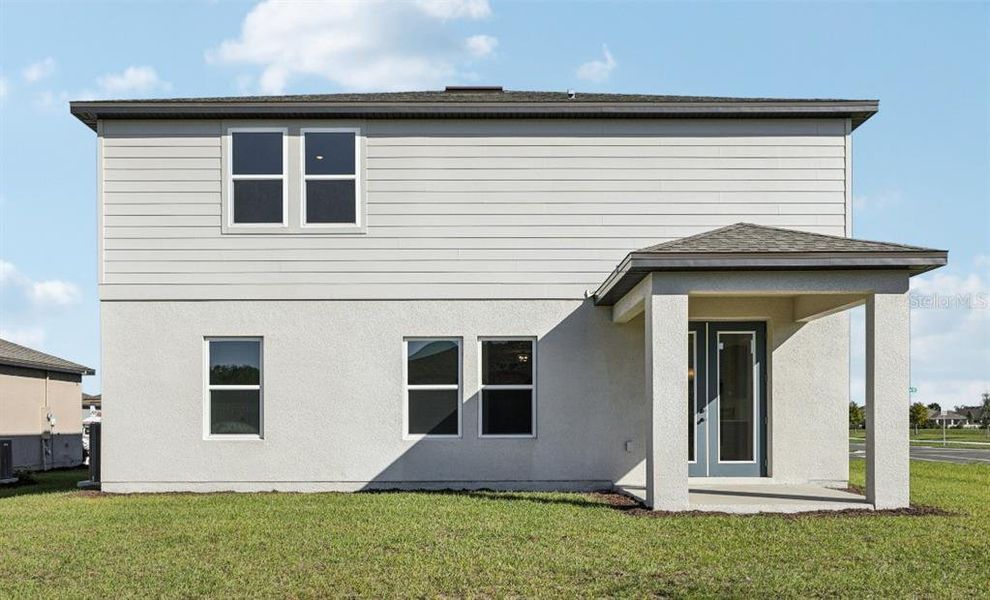 Exterior details and patio area of a home in Tyson Reserve, St. Cloud (Image 17).