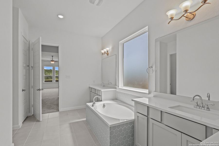 Furnished interior view inside a new home in Homestead 65', Schertz (Image 6).