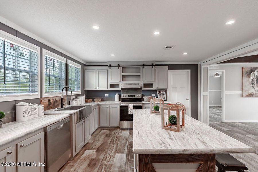 Furnished interior view inside a new home in , Florahome (Image 12).