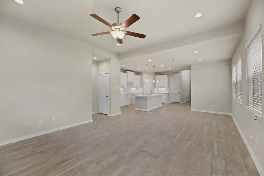Representative unfurnished interior of a home built from the Sedona by Chesmar Homes in Sunterra, Katy (Image 6).