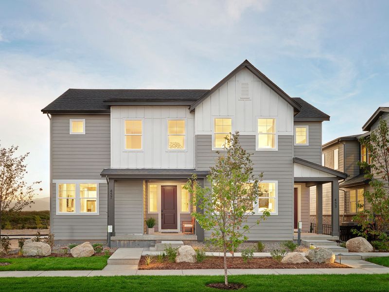 Front exterior of a new home in Sugar Mill Village, Longmont, CO, highlighting curb appeal (Image 1). Front exterior of a new home in Sugar Mill Village, Longmont, CO, highlighting curb appeal (Image 1).