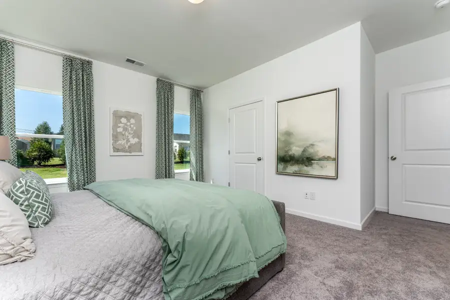 Furnished interior view inside a new home in Marlin Pointe, White House (Image 13).
