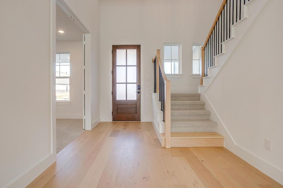 Representative furnished interior of a home built from the Eleanor by Graham Hart Home Builder in Sweetgrass, Haslet (Image 10).