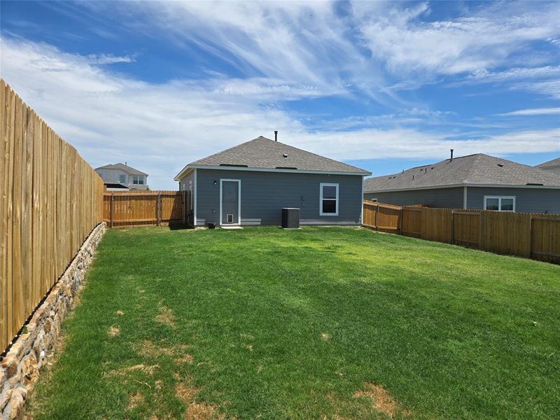 Front exterior of a new home in Big Sky Estates, Ponder, TX, highlighting curb appeal (Image 19).