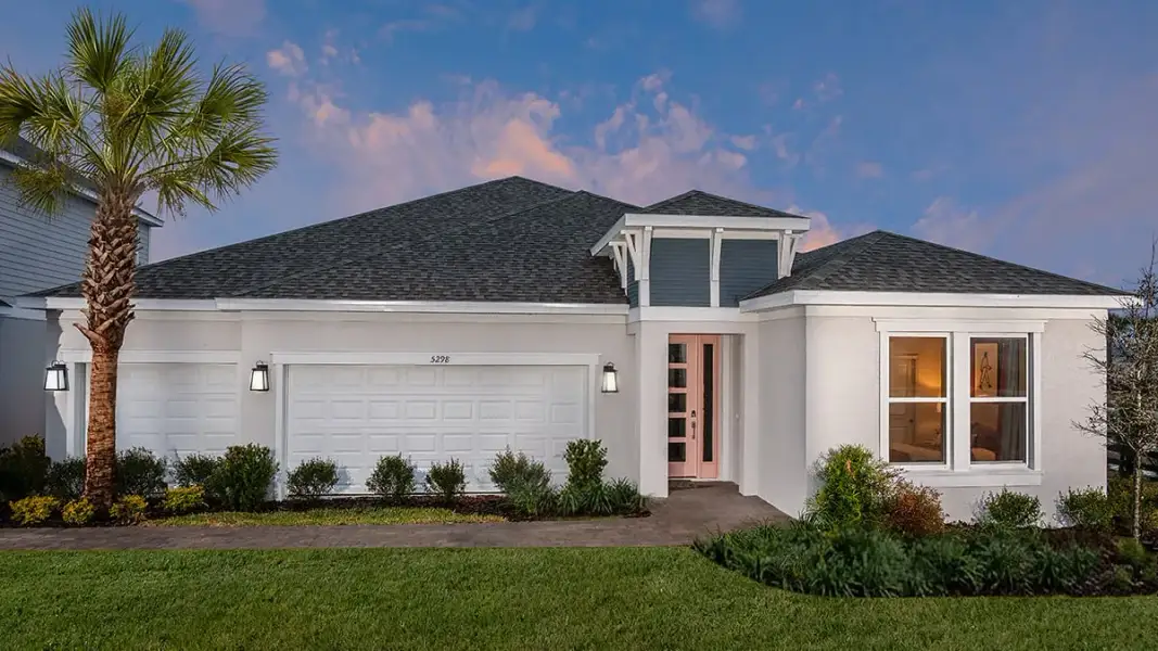 Representative exterior photo of a completed home built from the Bainbridge by Taylor Morrison in Azure at Solaeris, Port St. Lucie, FL (Image 23).