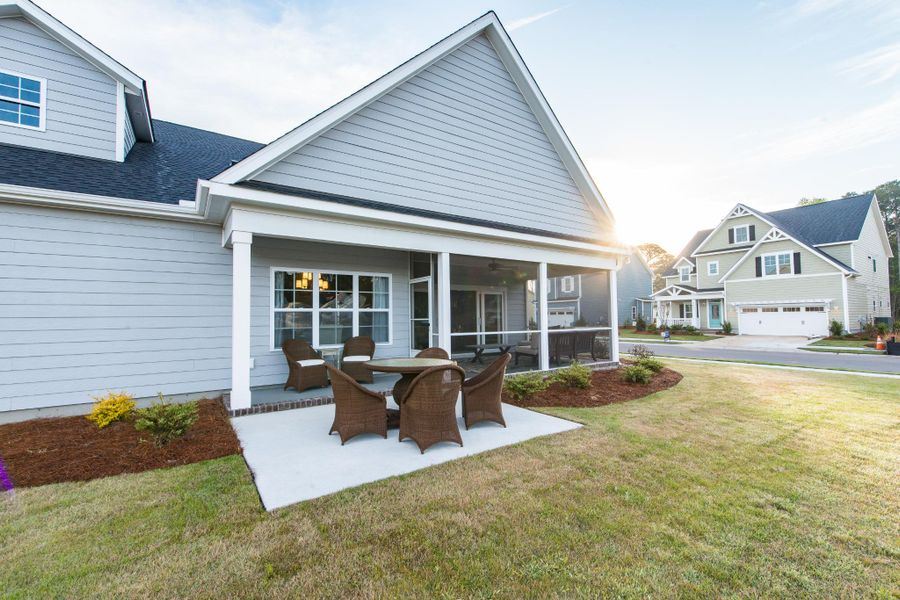 Representative exterior photo of a completed home built from the Helmsley by Bill Clark Homes in The Sanctuary at Sunset Beach, Sunset Beach, NC (Image 33). Representative exterior photo of a completed home built from the Helmsley by Bill Clark Homes in The Sanctuary at Sunset Beach, Sunset Beach, NC (Image 33).