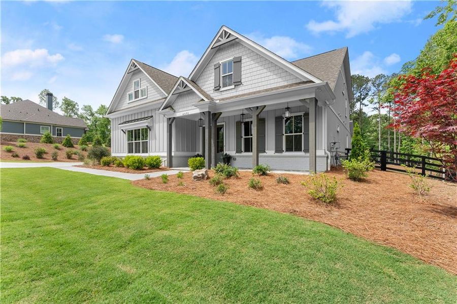 Front exterior of a new home in , Gainesville, GA, highlighting curb appeal (Image 33).