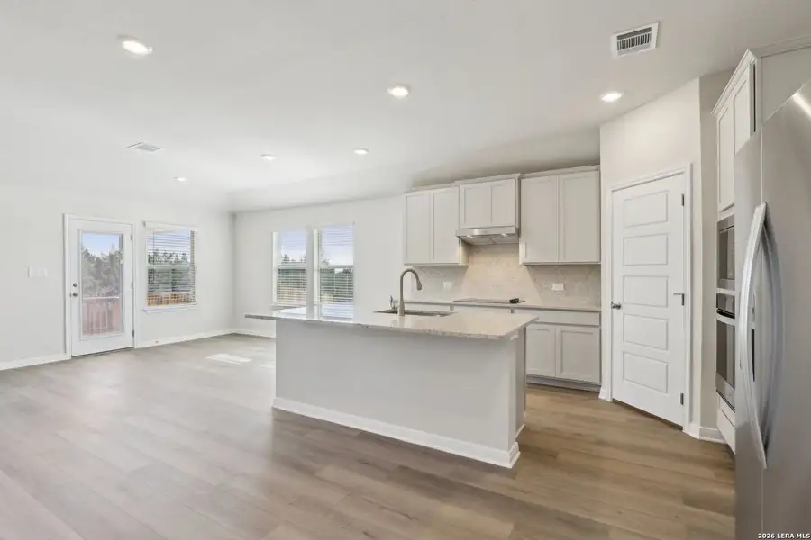 Furnished interior view inside a new home in Legendary Trails - Classic Series, Cibolo (Image 7).