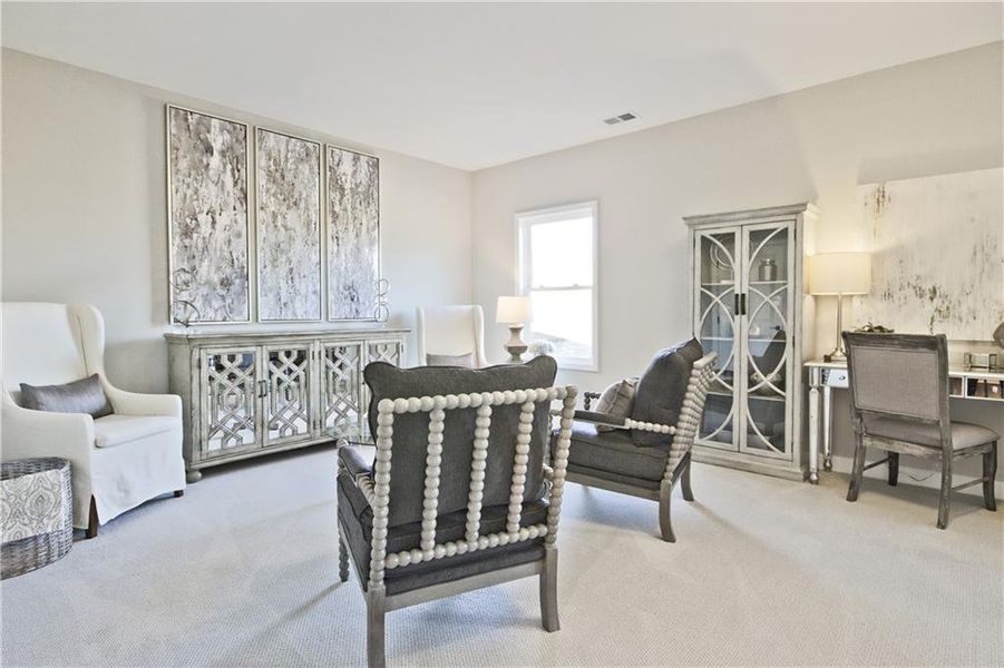 Furnished interior view inside a new home in Courtyards at Traditions, Cumming (Image 30).