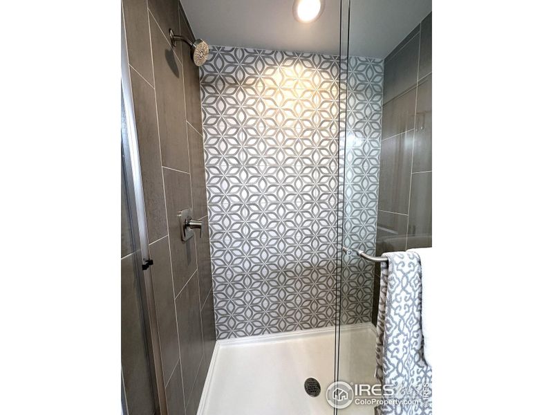 Main shower designer tile to ceiling