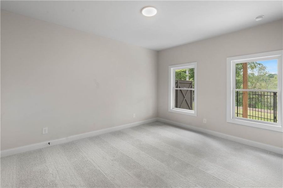 Spacious, unfurnished interior of a new home in Ward's Crossing Townhomes, Johns Creek (Image 20).