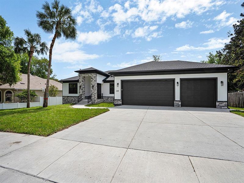Front exterior of a new home in , Safety Harbor, FL, highlighting curb appeal (Image 25).