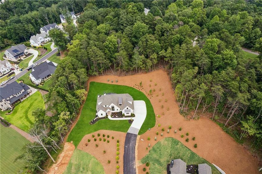 Front exterior of a new home in , Cumming, GA, highlighting curb appeal (Image 27).