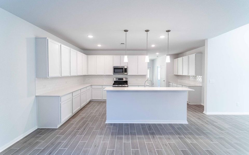 Furnished interior view inside a new home in Caney Mills, Conroe (Image 2).