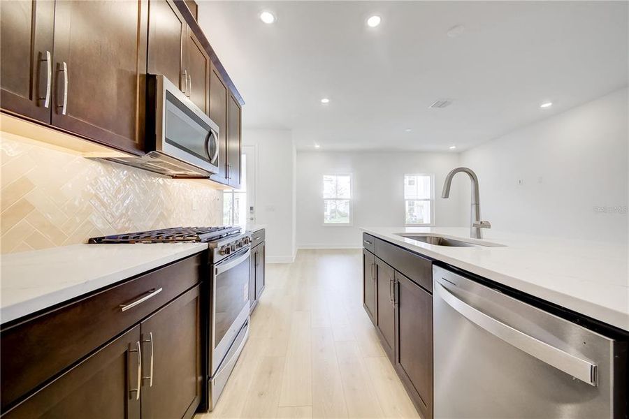 Furnished interior view inside a new home in Bungalow Walk at Lakewood Ranch, Sarasota (Image 5).