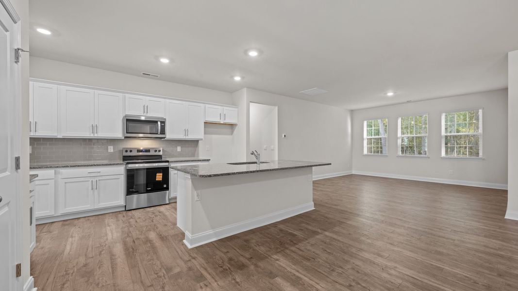 Furnished interior view inside a new home in Tyler - Home on the Lake, New Bern (Image 5).