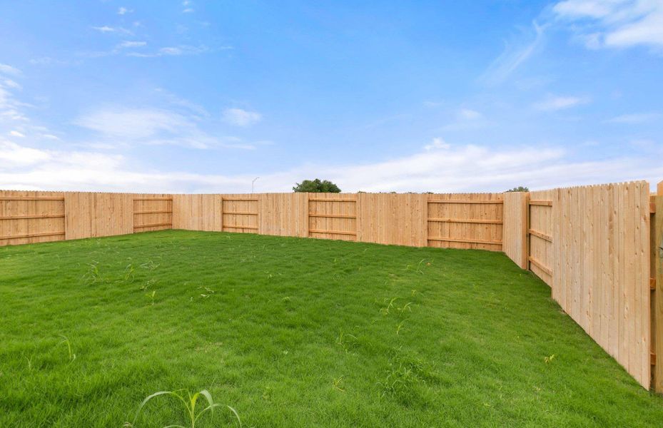 Front exterior of a new home in Patterson Ranch, Georgetown, TX, highlighting curb appeal (Image 25). Front exterior of a new home in Patterson Ranch, Georgetown, TX, highlighting curb appeal (Image 25).