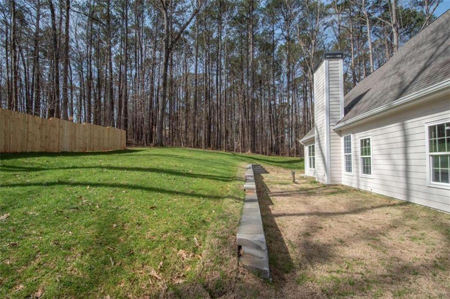 Front exterior of a new home in , Jonesboro, GA, highlighting curb appeal (Image 30).