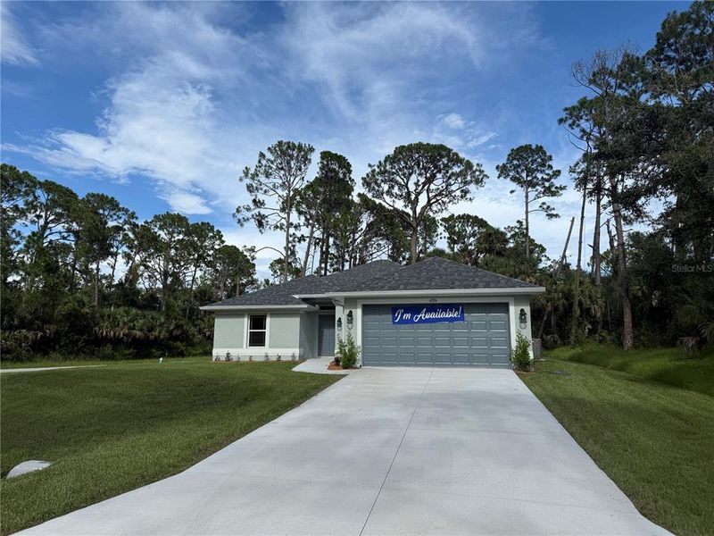 Front exterior of a new home in North Port, North Port, FL, highlighting curb appeal (Image 9).