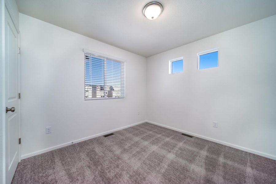 Spacious, unfurnished interior of a new home in Muegge Farms, Bennett (Image 20).
